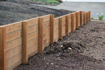 Prevent Soil Erosion with Retaining Wall Repair!